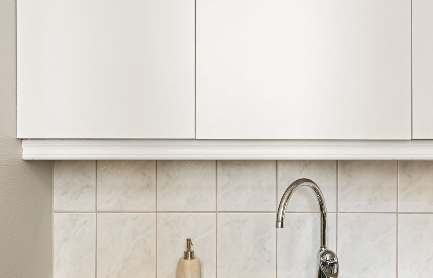 Modern kitchen with built-in appliances — local Amana appliance repair