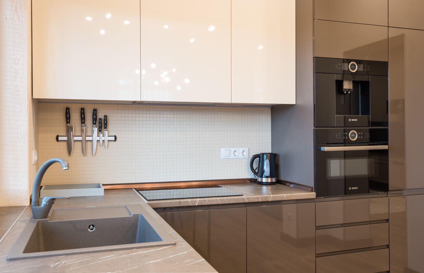 Open-plan kitchen with an island and built-in appliances — independent Amana appliance service