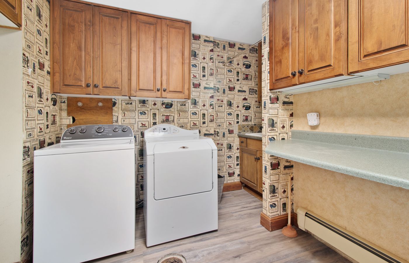A home laundry room with a washer and dryer — local Amana appliance repair