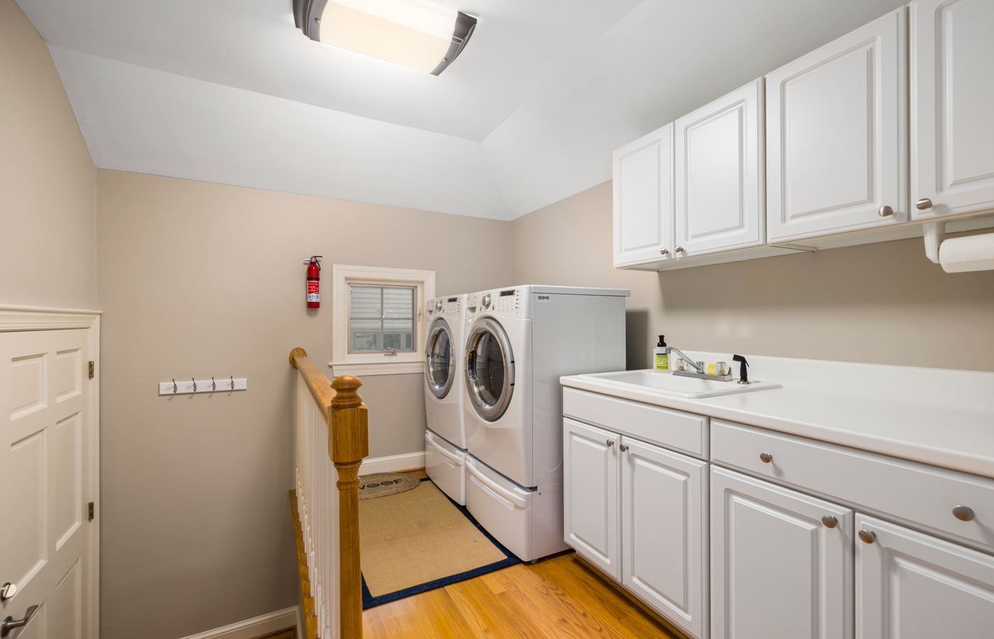 A tidy laundry room with front-load machines — Amana repair technicians near you