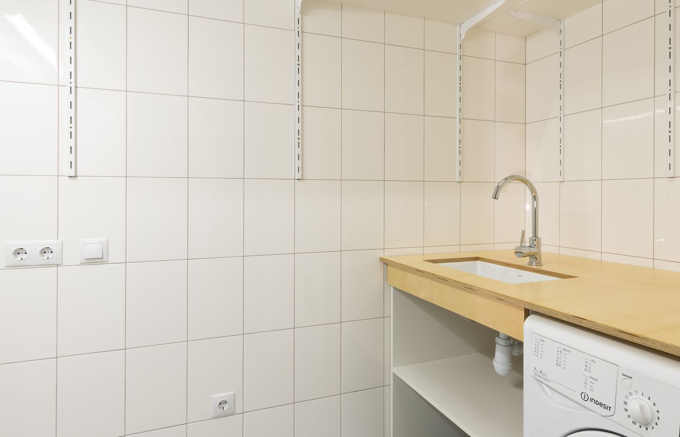 A tidy laundry room with front-load machines — Amana repair technicians near you